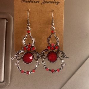 New Silvertone dangle earrings with Redstone accents